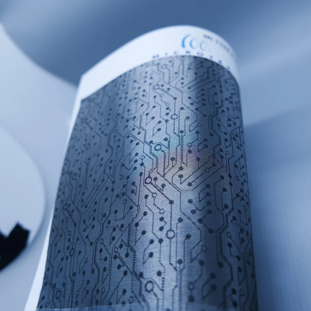 Jacquard carbon fiber fabric with optical design